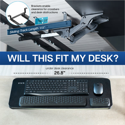An under desk keyboard tray with compatibility measurements displayed. 