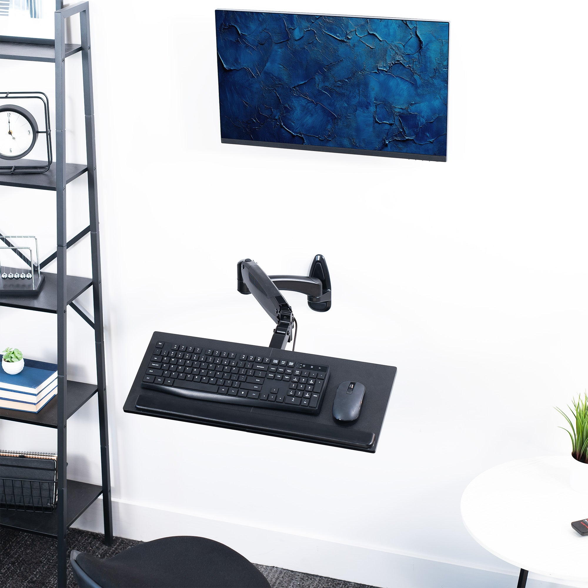 Sturdy steel pneumatic height adjustable keyboard tray wall mount with articulation.