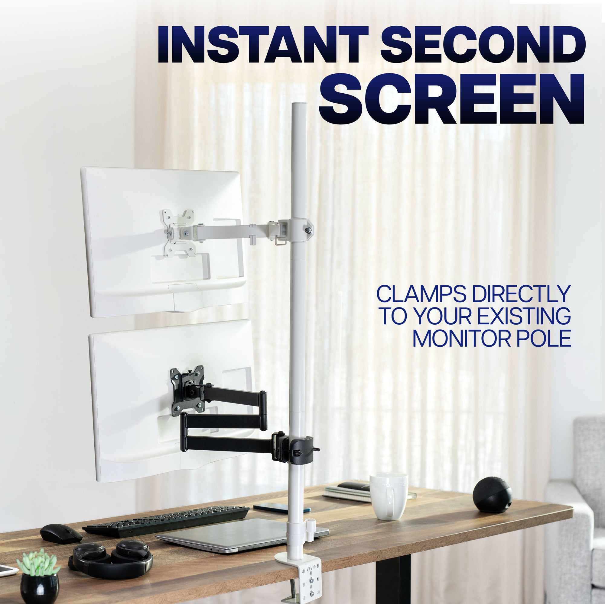 Long arm VESA pole mount adding a second monitor to a workstation without taking up desk space