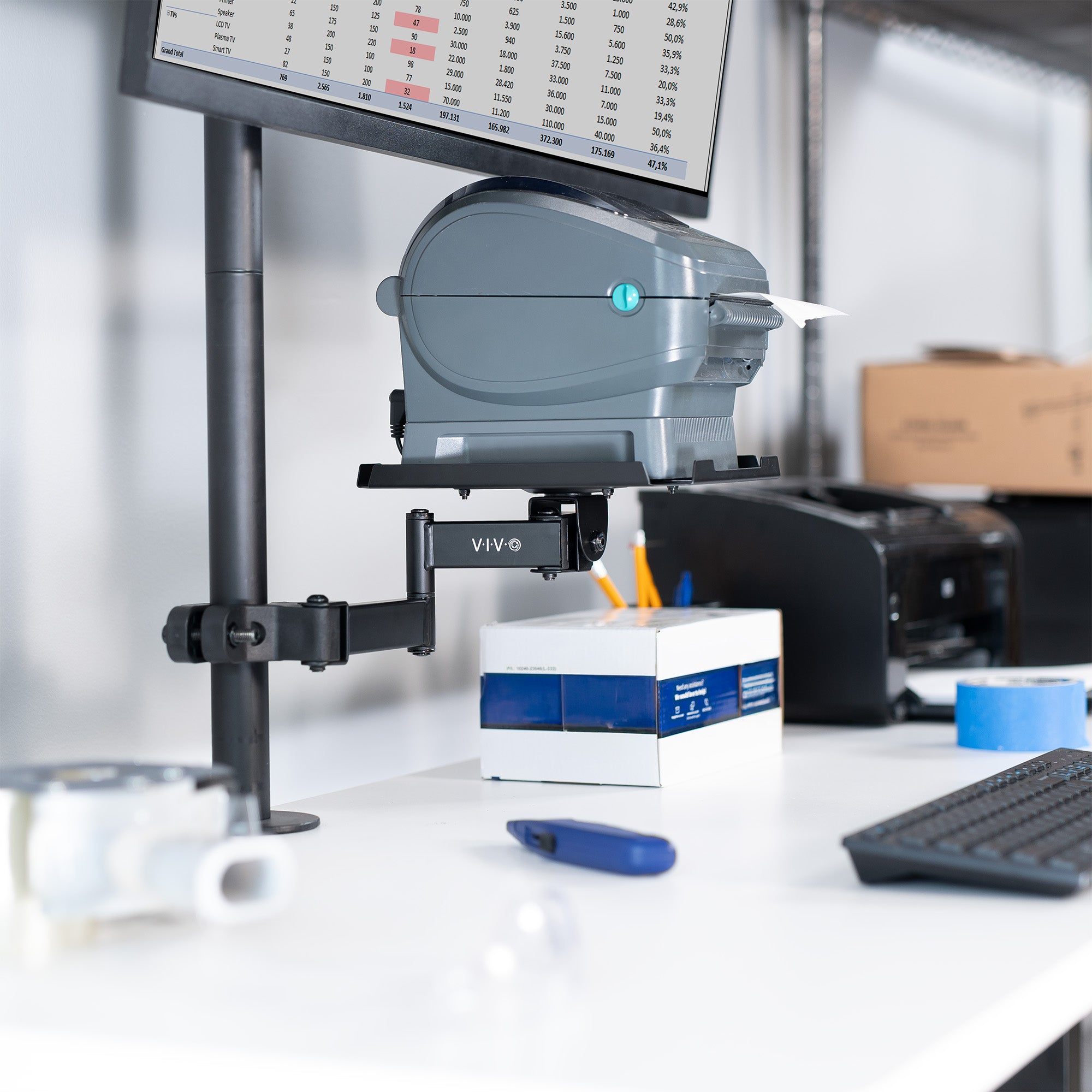 A black pole mount shelf with an articulating arm designed to attach to a pole.