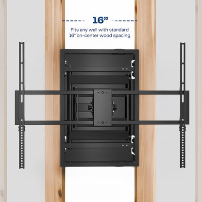 A black large TV wall mount in between two studs displaying that it can fit between standard wood studs. 