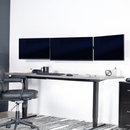 A black telescoping triple monitor wall mount with adjustable arms for mounting multiple screens.