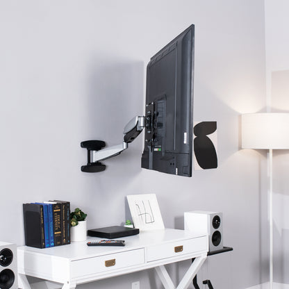 Height adjustable articulating pneumatic wall mount TV monitor arm.