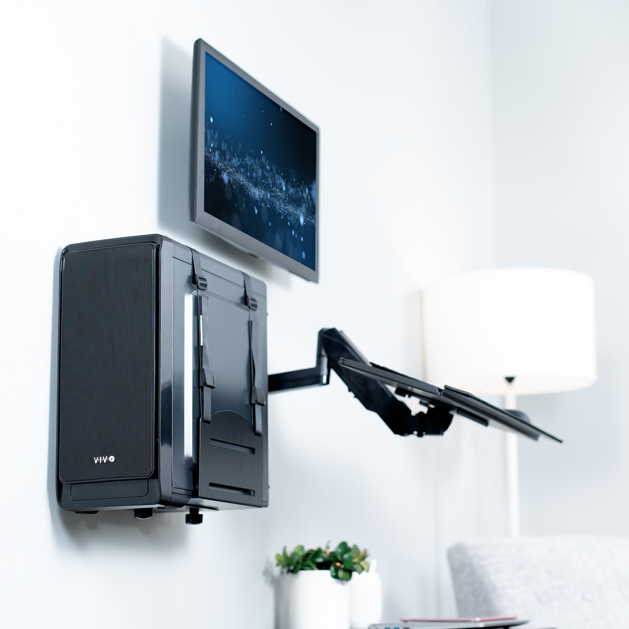 Single monitor height adjustable wall mount, articulating wall mounted keyboard tray, and PC wall mount with adjustable straps.