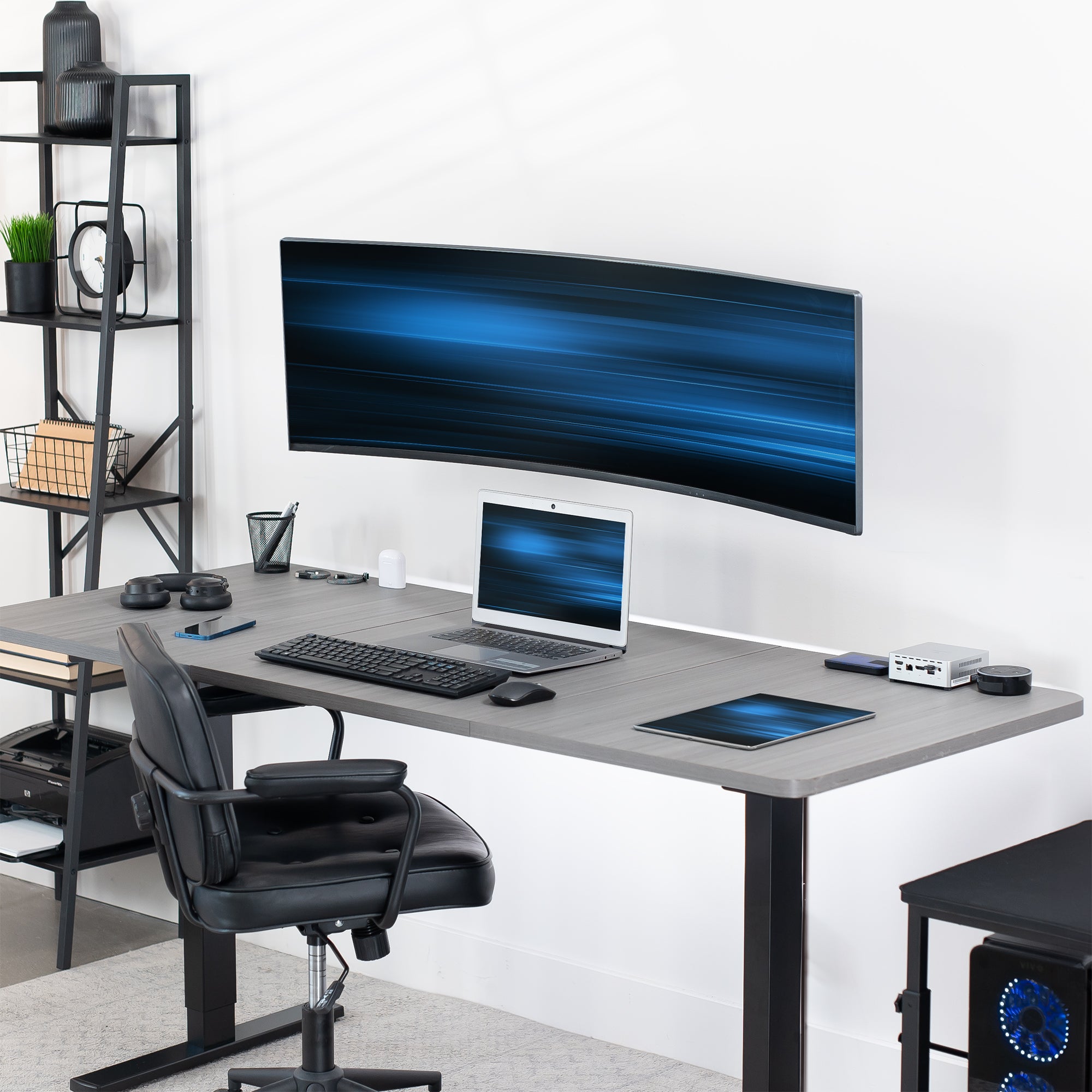 Articulating and height adjustable single ultrawide monitor wall mount.