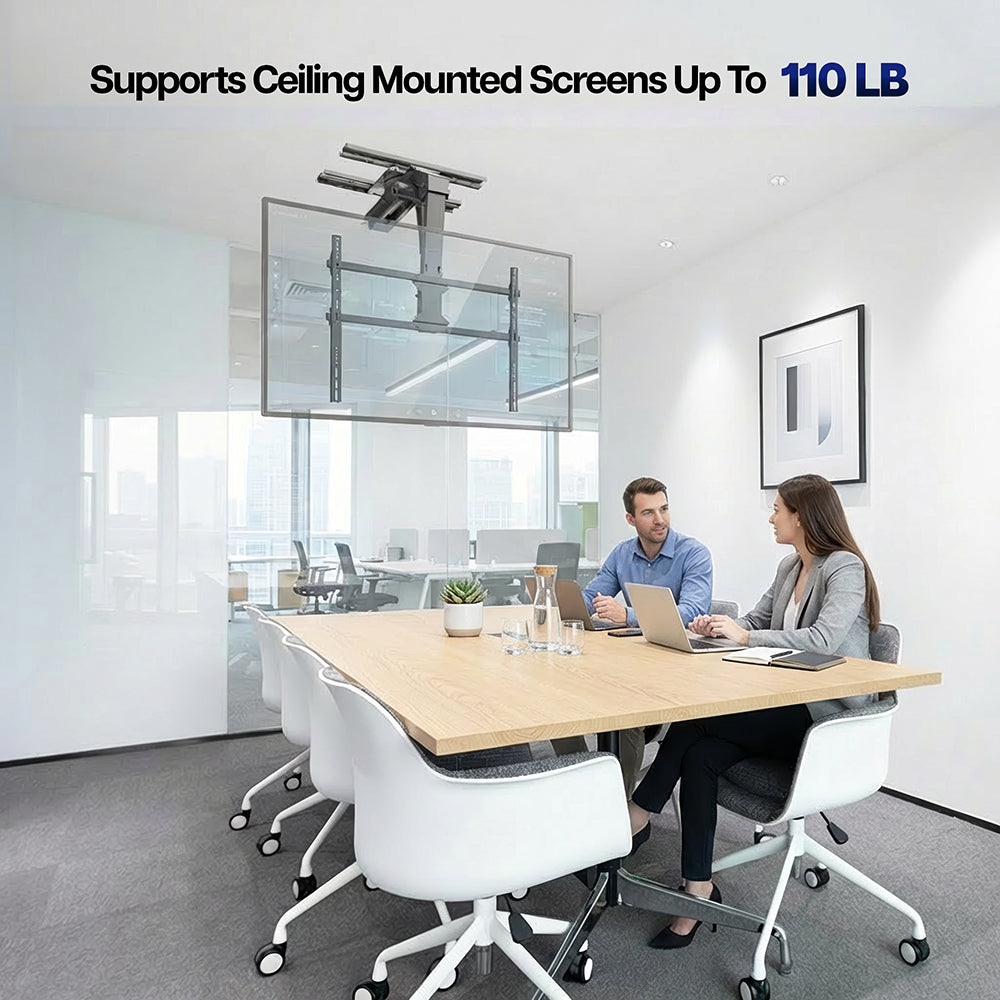 Ceiling-mounted screen support system in an office setting with two people at a desk.
