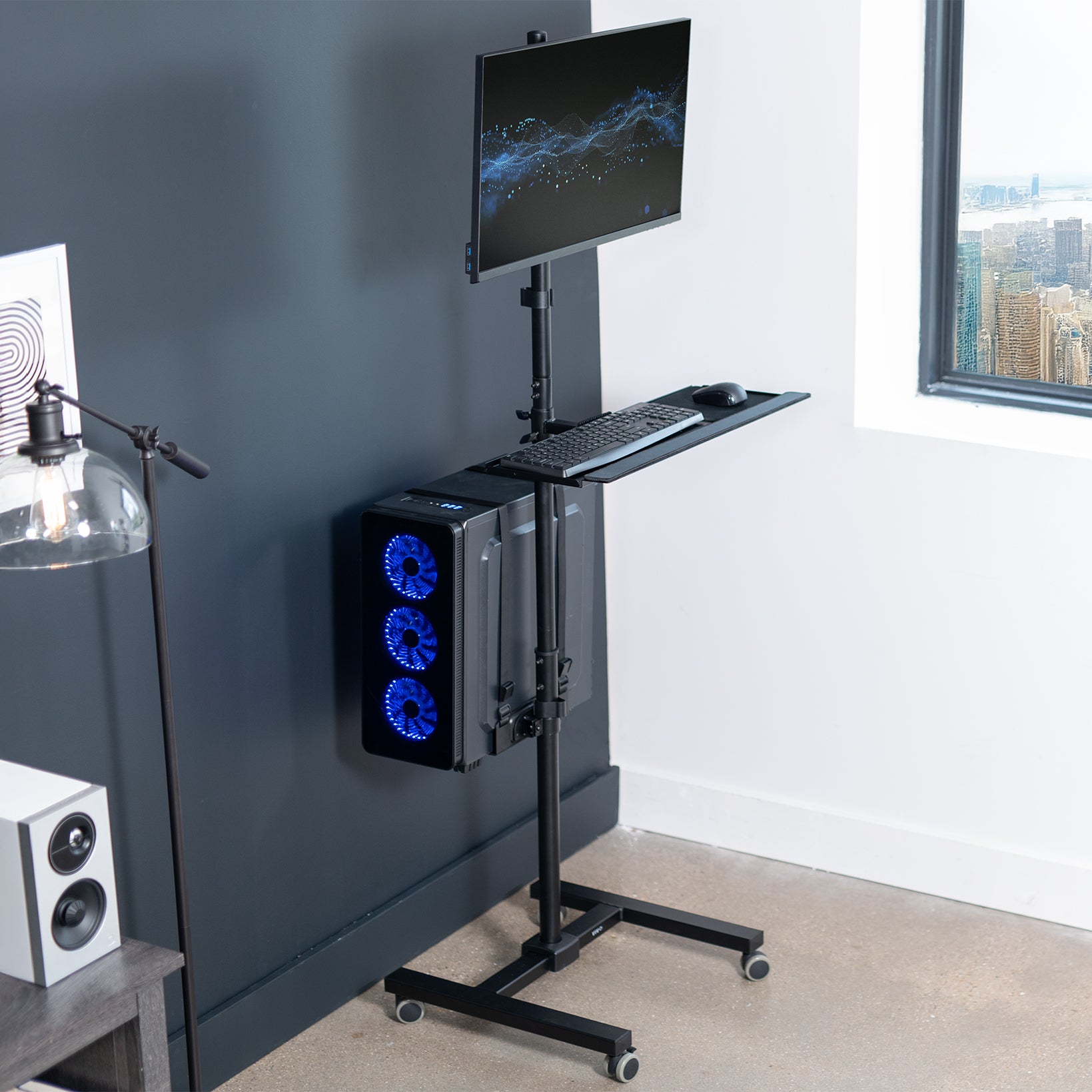 Mobile workstation cart with monitor mount, keyboard tray, PC holder, and locking wheels. Featuring 360 rotation and height adjustment.