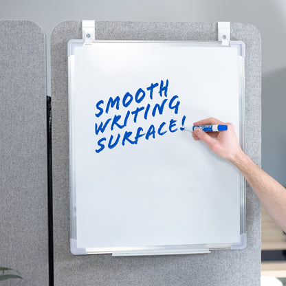 White, double-sided magnetic dry erase board mounted on a gray wall with a smooth writing surface. 