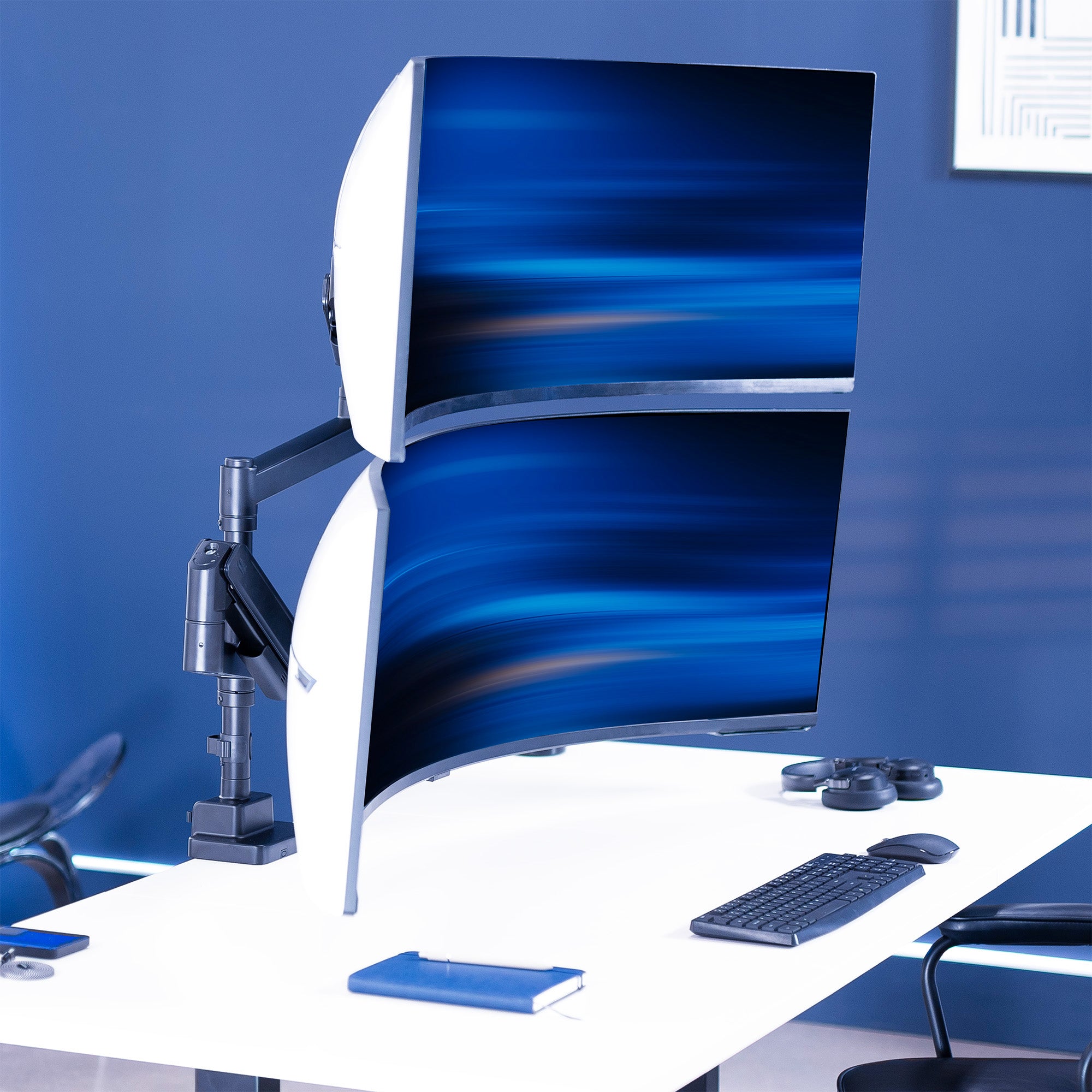 A dual monitor desk mount with pneumatic arms. 