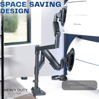 A dual monitor desk mount with pneumatic arms. 