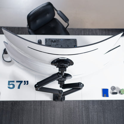 A dual monitor desk mount with pneumatic arms. 