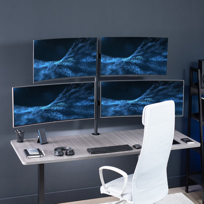 Heavy Duty Telescoping Quad Monitor Desk Mount for office use, giving your screen setup a flush with the wall display.