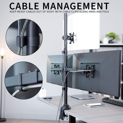 Desk setup with cable management system featuring cable clips and monitors.