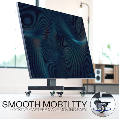 A low height mobile TV cart with a black frame and wheels with text on mobility. 