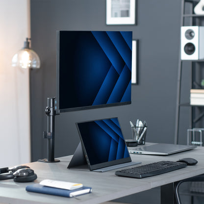Pneumatic single monitor mount in modern office space