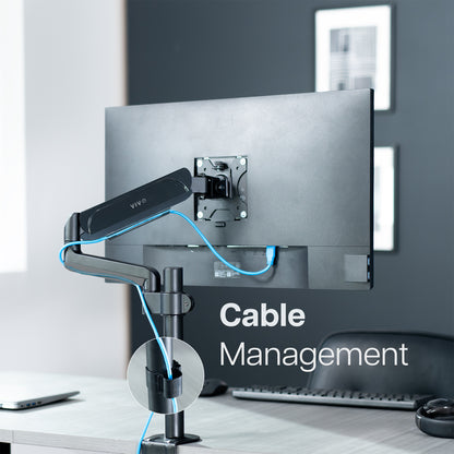 Cable management feature on pneumatic single monitor mount