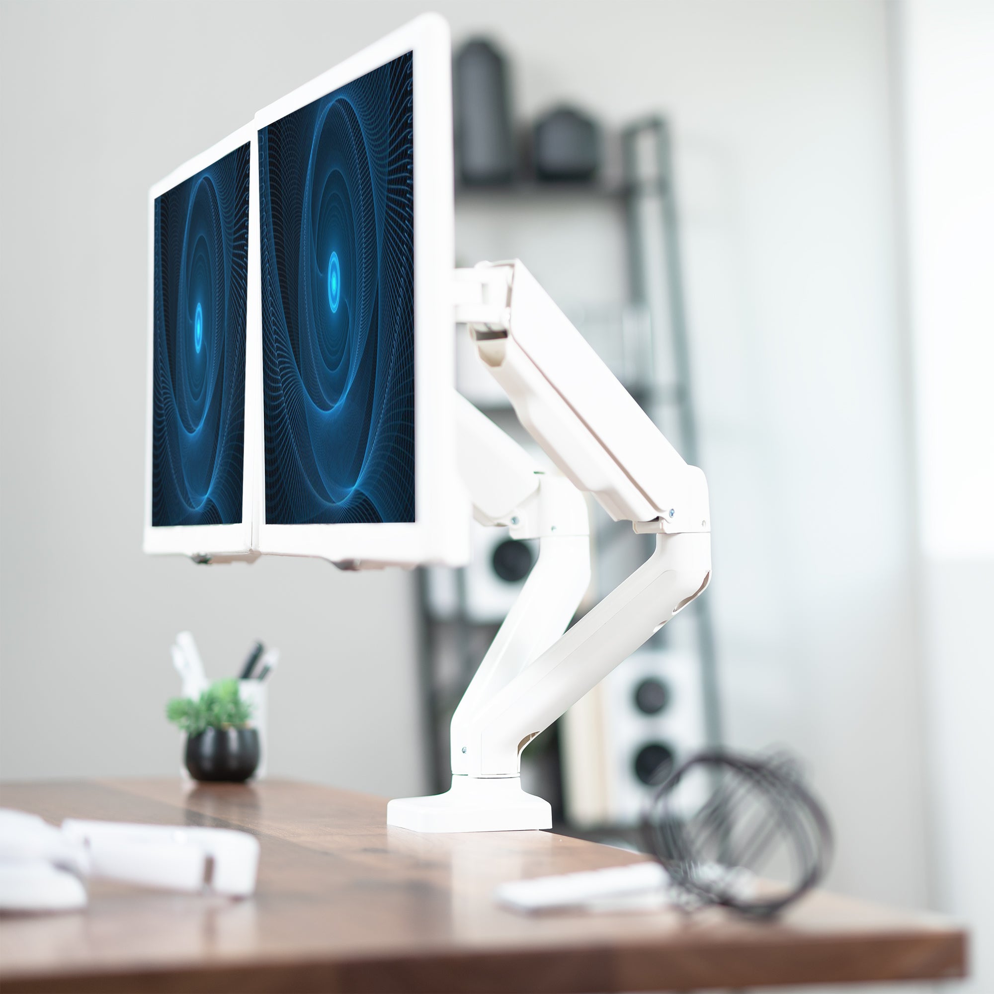 Sturdy adjustable mechanical arm dual monitor ergonomic desk stand for office workstation.