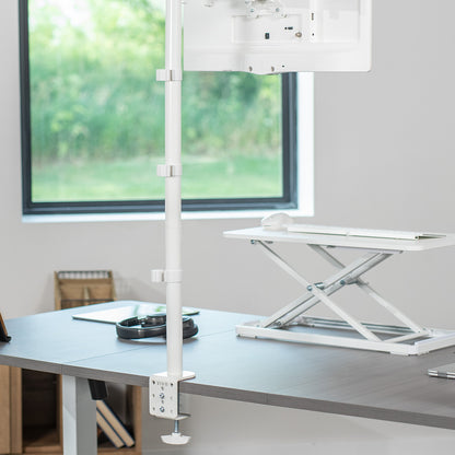 Extra tall desk mount for single monitor provides sit or stand application for the user, flexible viewing angles, and tall screen placement.