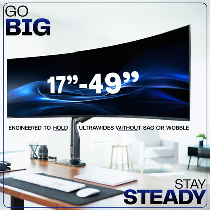 Monitor with text indicating size range and stability features on a blurred office background