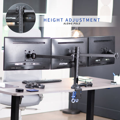 Triple monitor stand with height adjustment feature on a desk in an office setting.