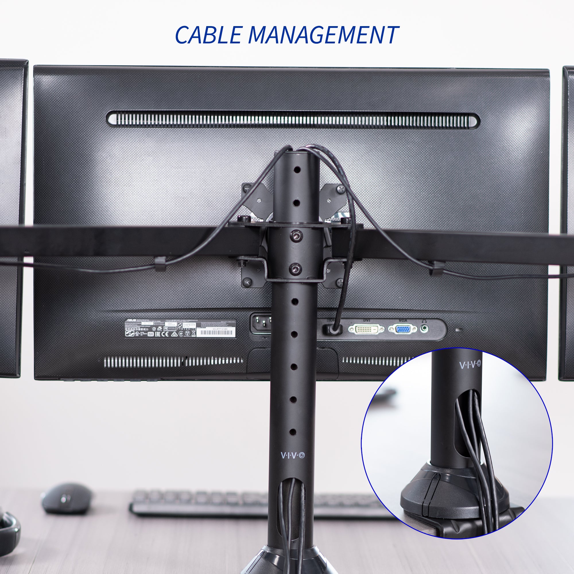 Computer monitors with cable management system on a desk