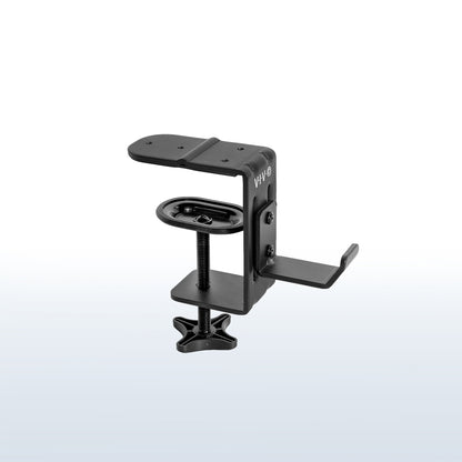 Heavy-duty under desk or desk leg clamp hook to hold accessories, bags, coats, and more. Weight capacity of up to 33 pounds and can clamp on almost anywhere.