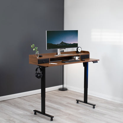 Dual tier height adjustable mobile electric desk with storage drawers.