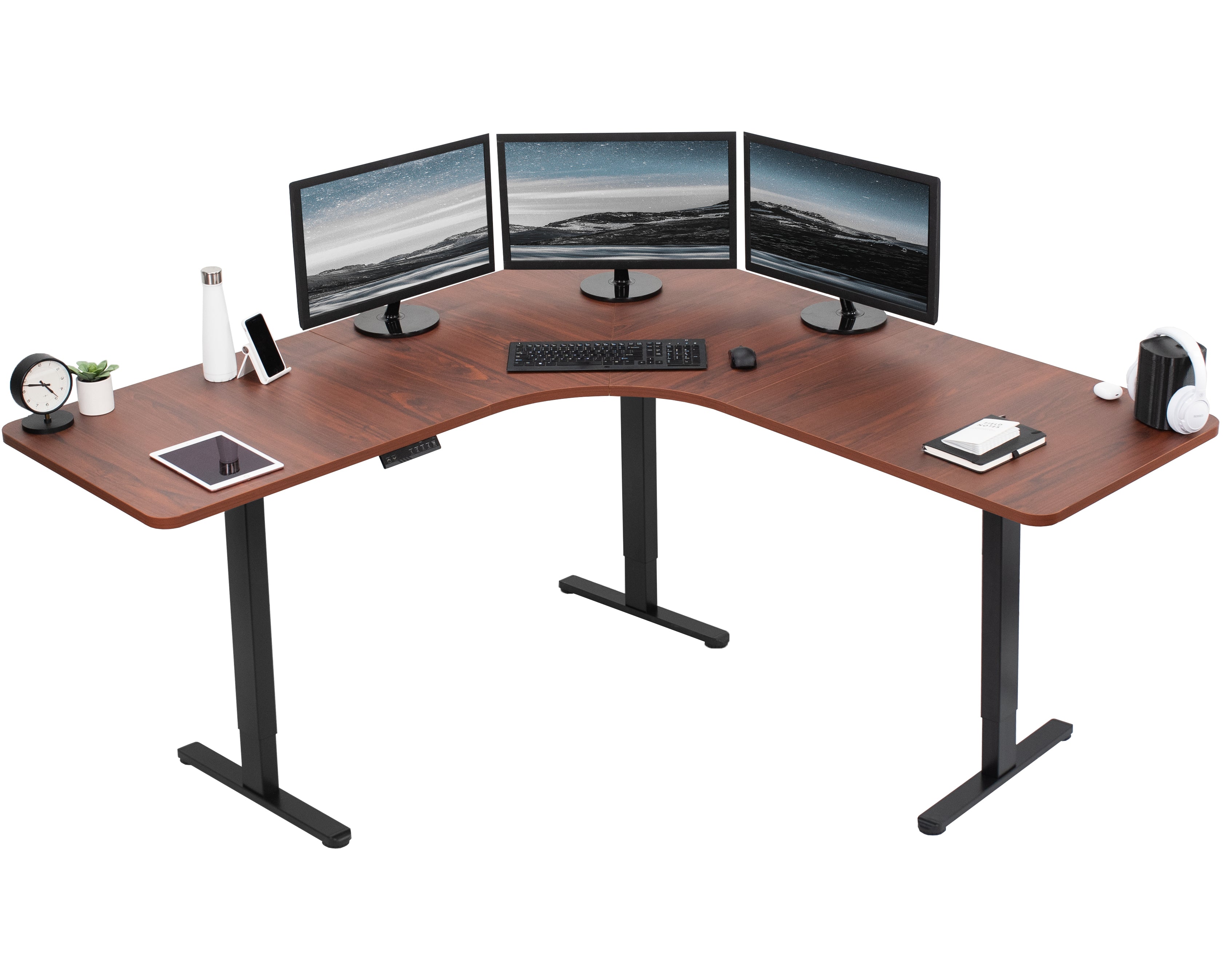 Large heavy-duty electric height adjustable corner desk workstation with programmable memory controller.