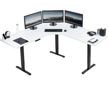 Large heavy-duty electric height adjustable corner desk workstation with programmable memory controller.