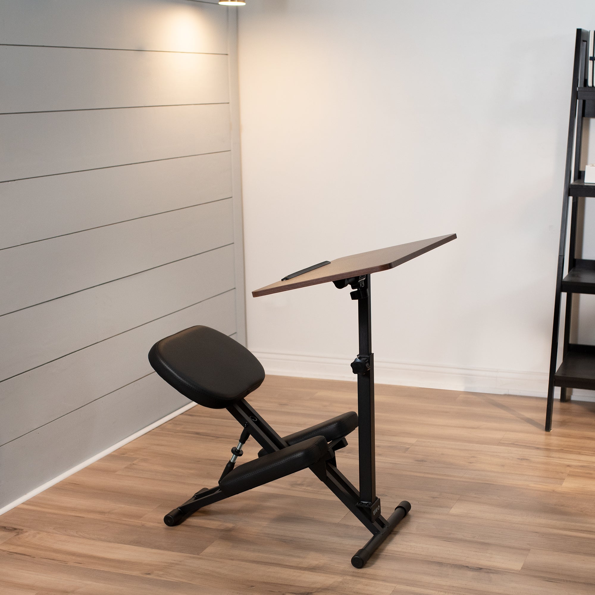 Comfortable kneeling chair desk for tension relief and posture.