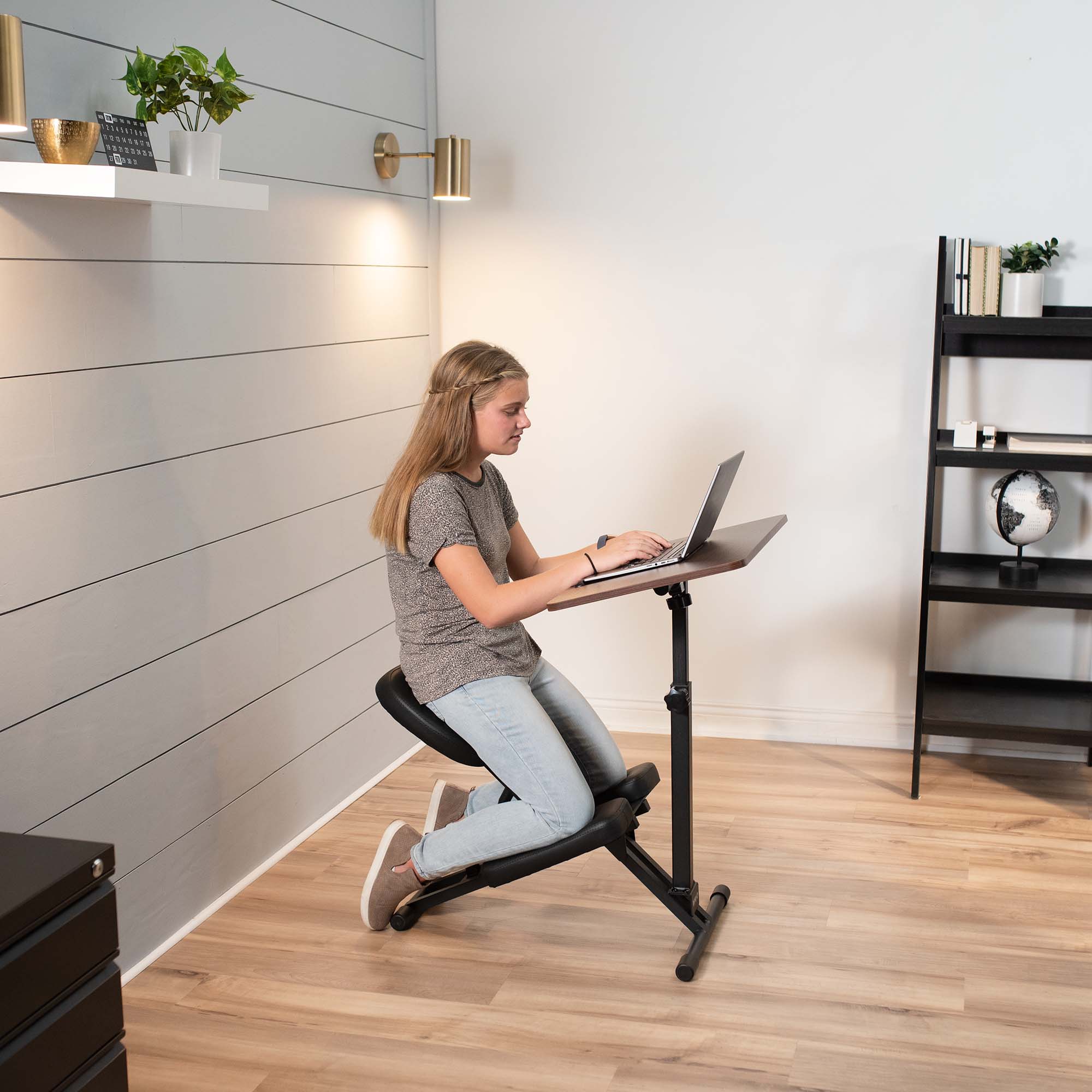 Comfortable kneeling chair desk for tension relief and posture.