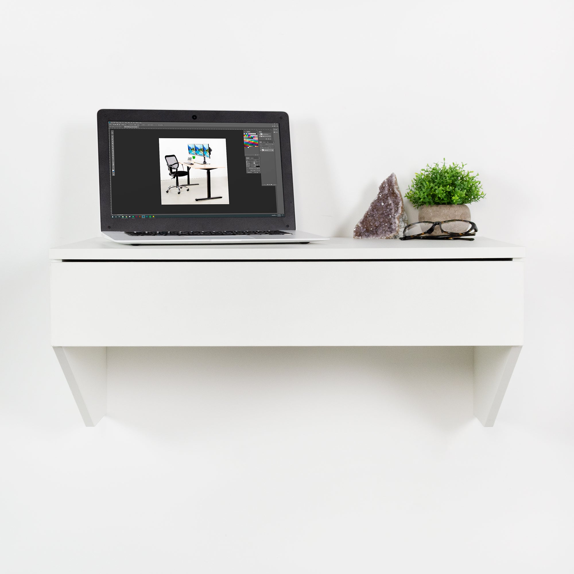 Sturdy wall mount desk with drawer.