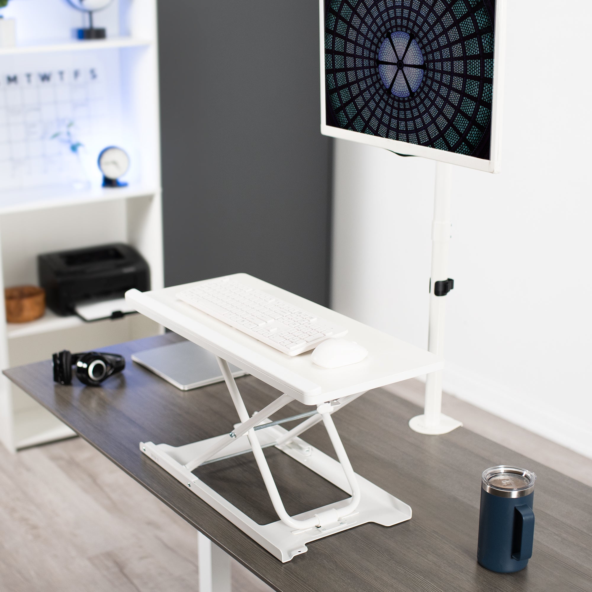 Sturdy height adjustable desk converter keyboard riser.