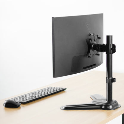 Monitor stand with attachable VESA bracket converter.