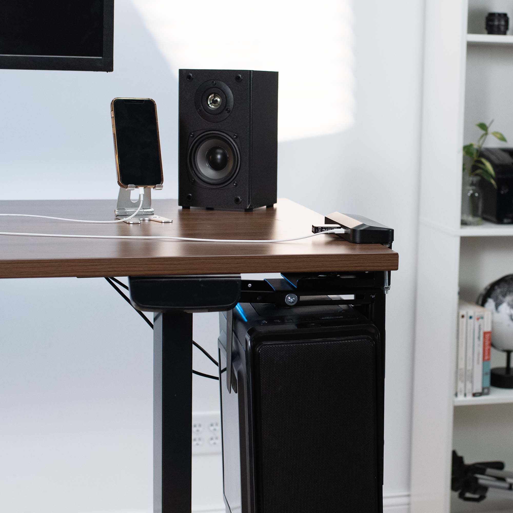 Sturdy clamp-on mount computer holder with USB ports for convenient charging and connecting to PC.