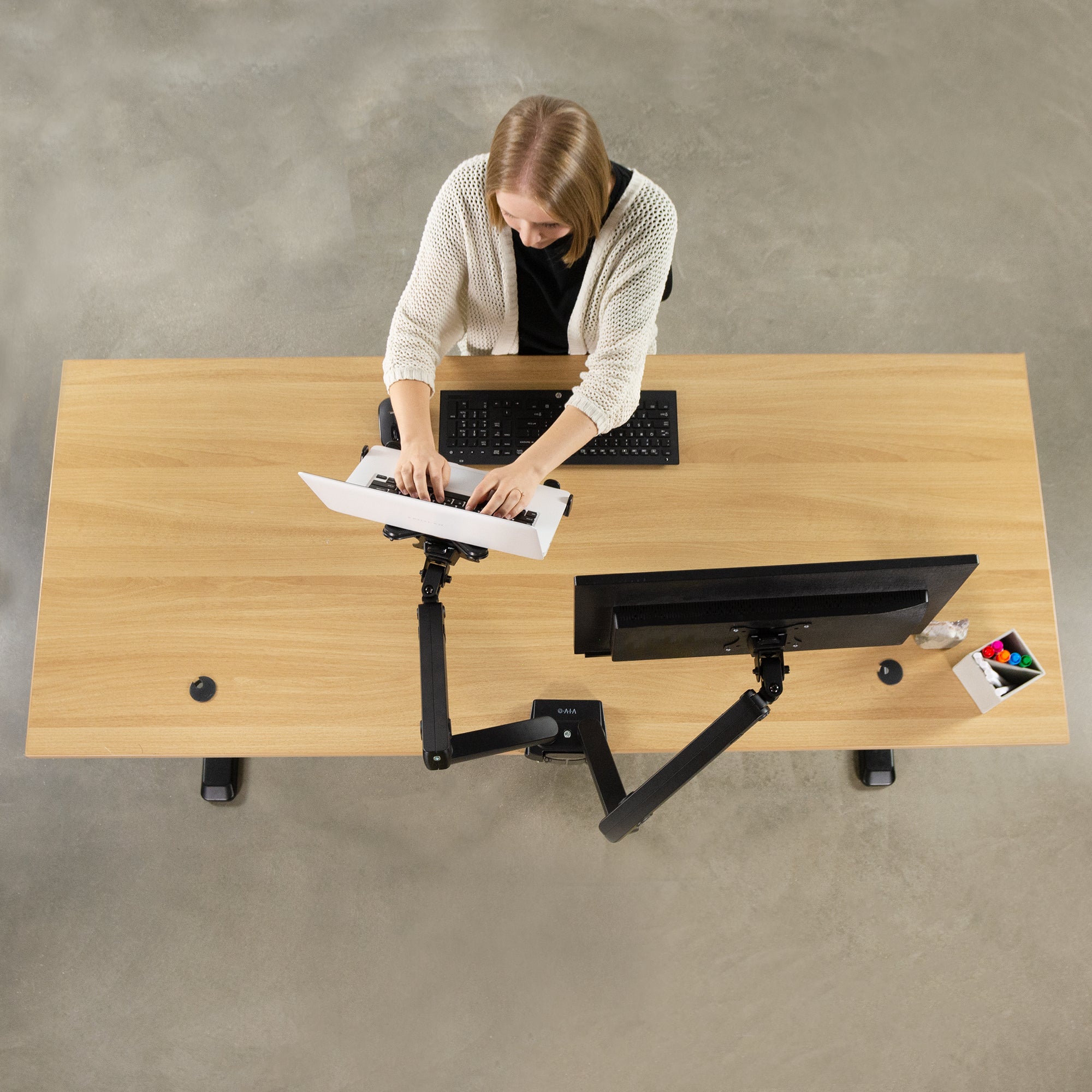 Ergonomic VESA compatible laptop holder.