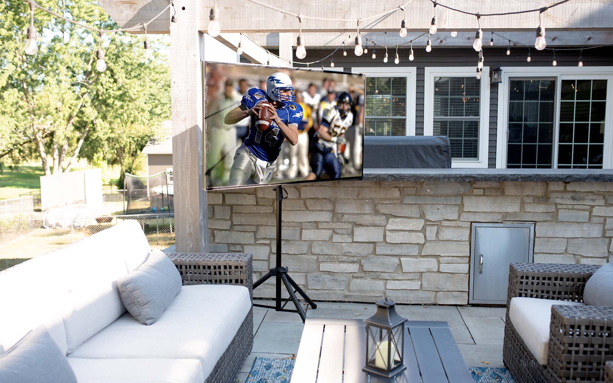 Tripod base TV stand outside.