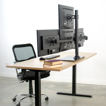 Sturdy height adjustable quad monitor desk stand.